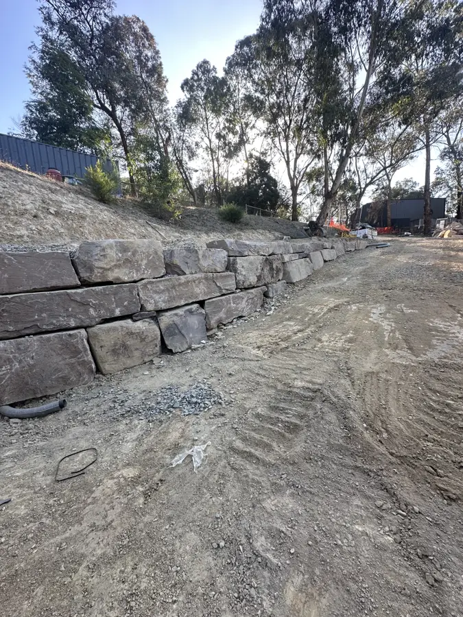 Entire Excavations — rock supply and installation detail