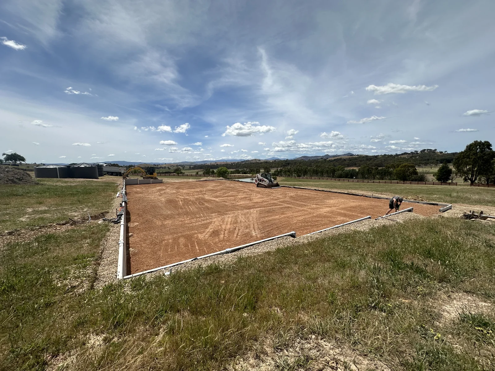 Entire Excavations — rural site preparation with Posi-Track skid steer